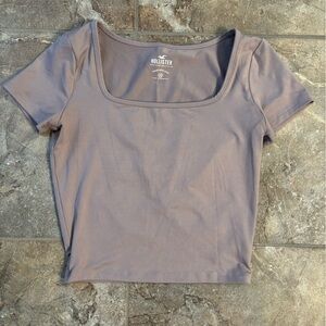 Hollister Lavender/Grey cropped tee. Short Sleeve Tee. Size xs